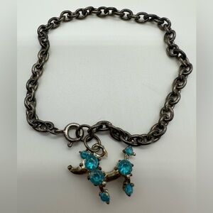 Vintage blue rhinestone silver tone chain charm bracelet with poodle charm